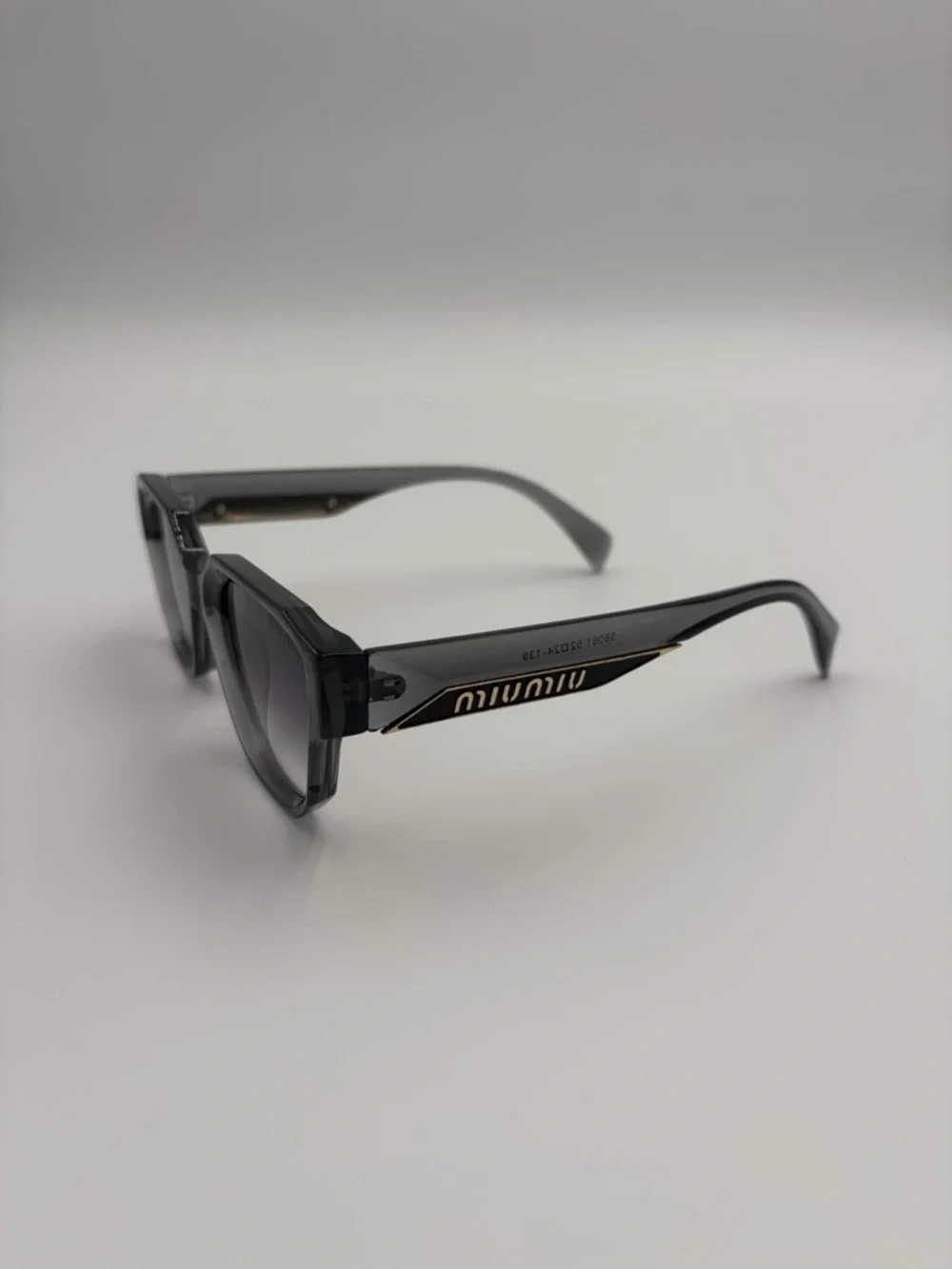 Miu Miu Translucent Smoke Frame Sunglasses with Gradient Lenses - Picture 3 of 5